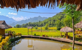 Day 1: Hanoi - Thung Khe Pass - Mai Chau Flag Tower - Mai Chau With Love Homestay - Cycling  (L/D)